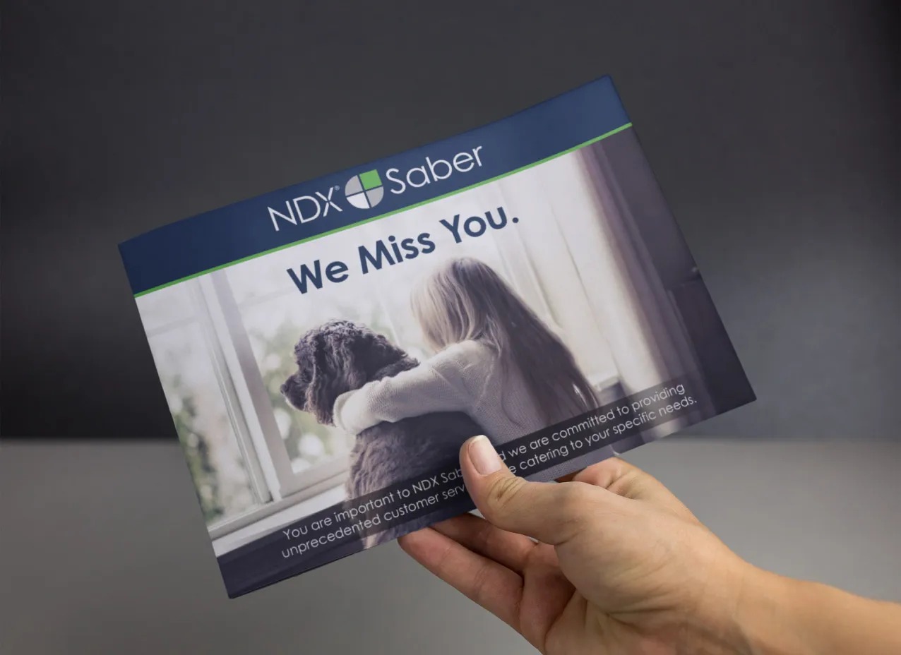 Mailer design for National Dentext Labs, a Designity client.