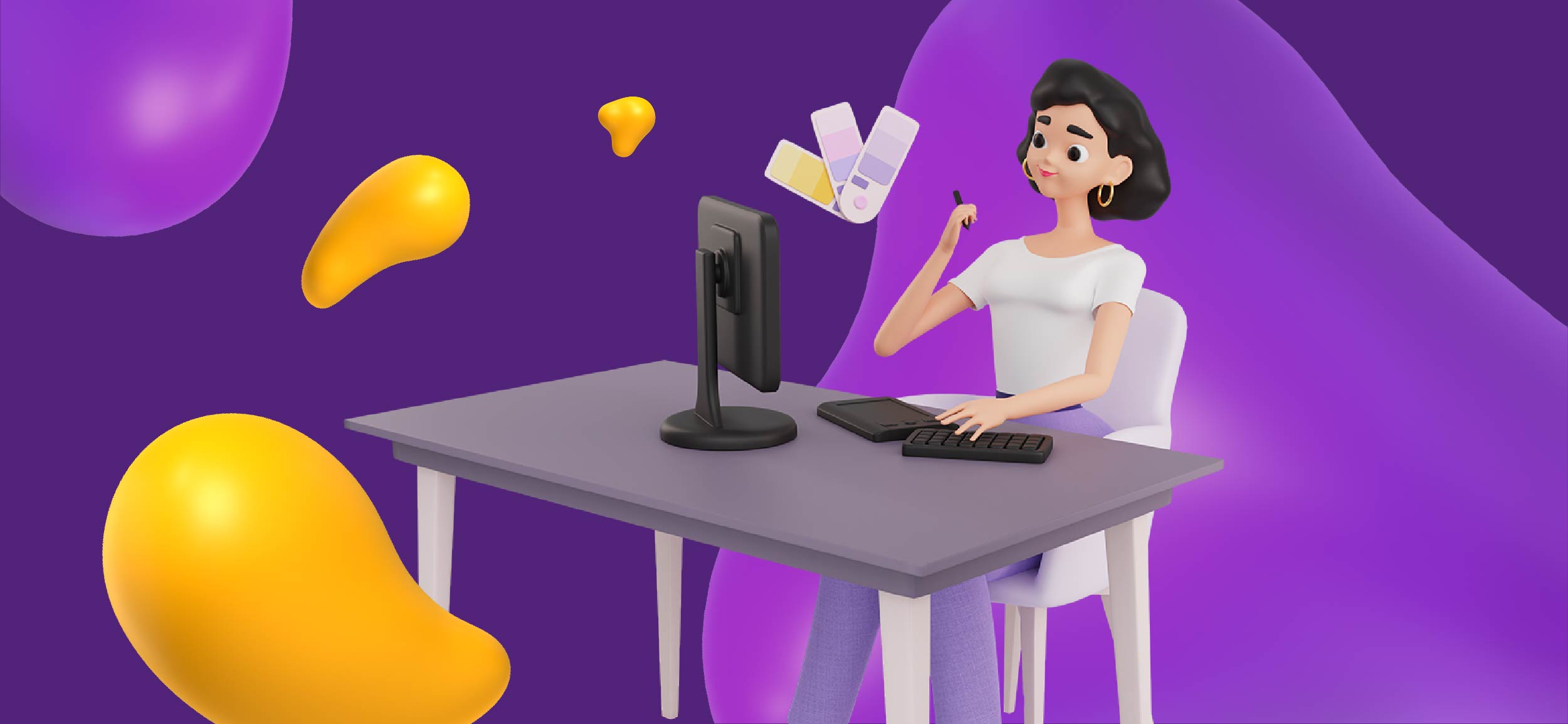 A digital designer sitting at her computer.