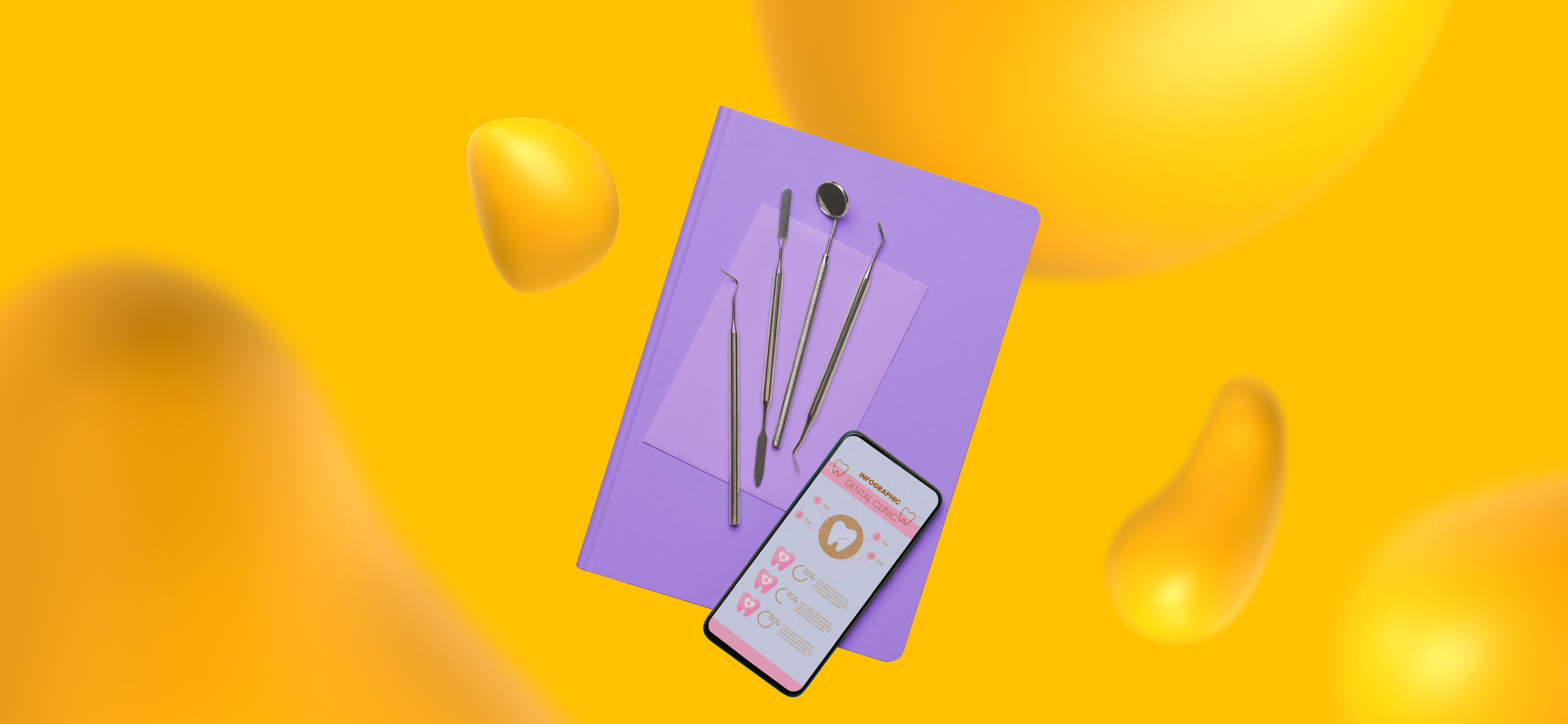 Dental equipment sitting on a purple mat beside a phone with a dental website loaded on its screen.