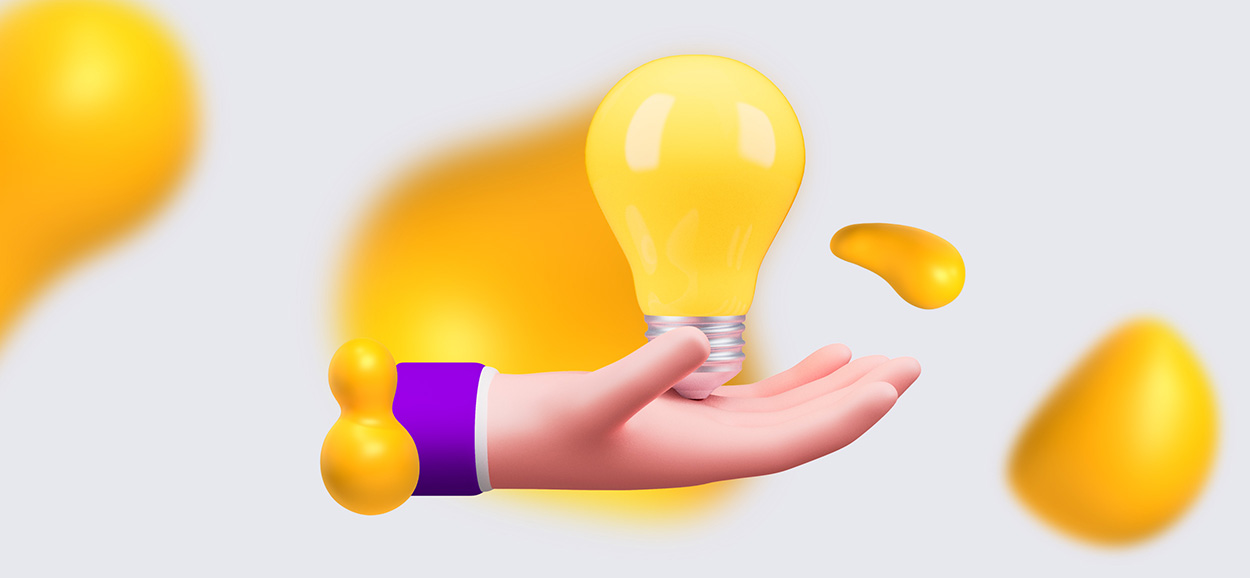 A hand holding a lightbulb. Here are some SEO copywriting ideas!
