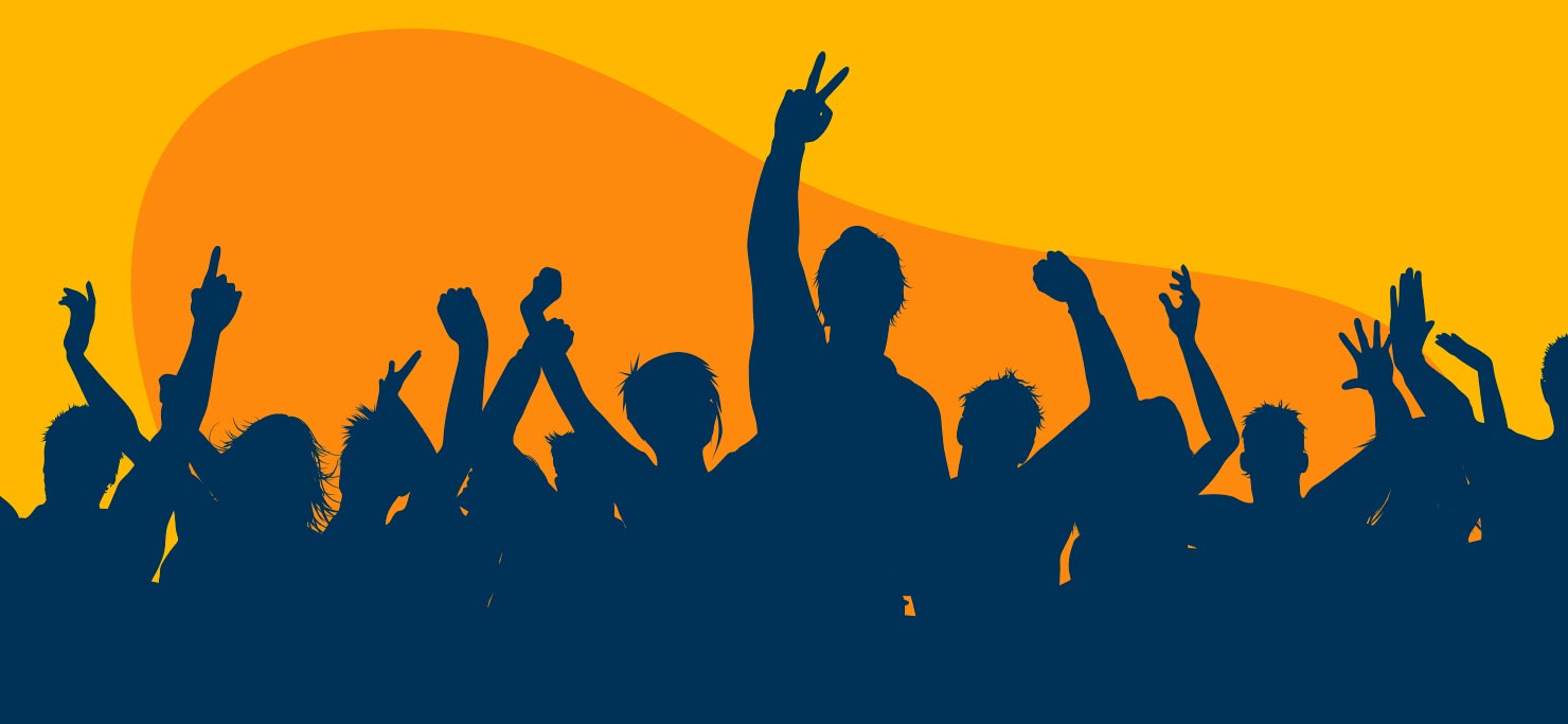 Silhouette of an audience enjoying a show.