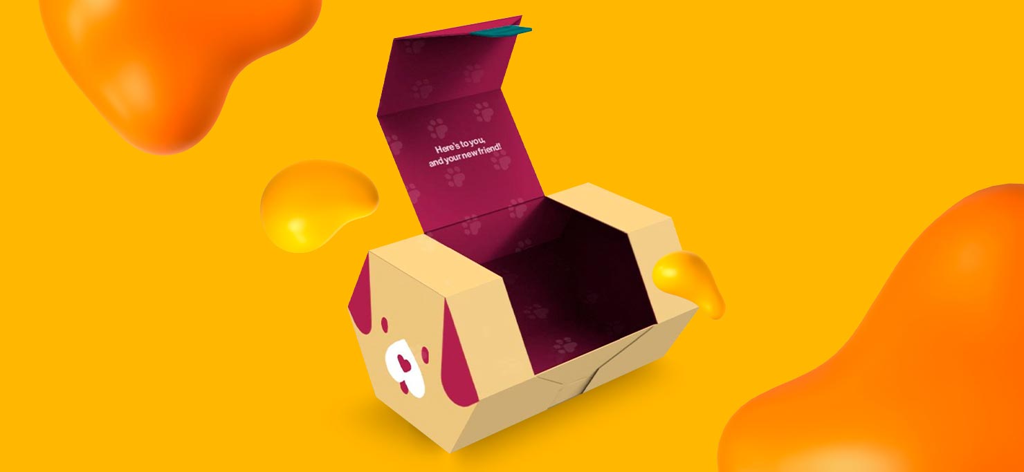 A package designed to look like a puppy. Its lid is open and reads, "Here's to you and your new friend!"