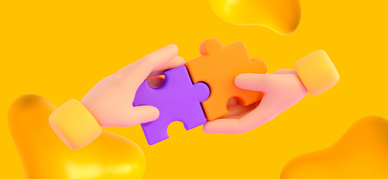 Two hands connect two matching puzzle pieces, symbolizing how Creative Directors and Project Managers work together for the success of marketing projects.