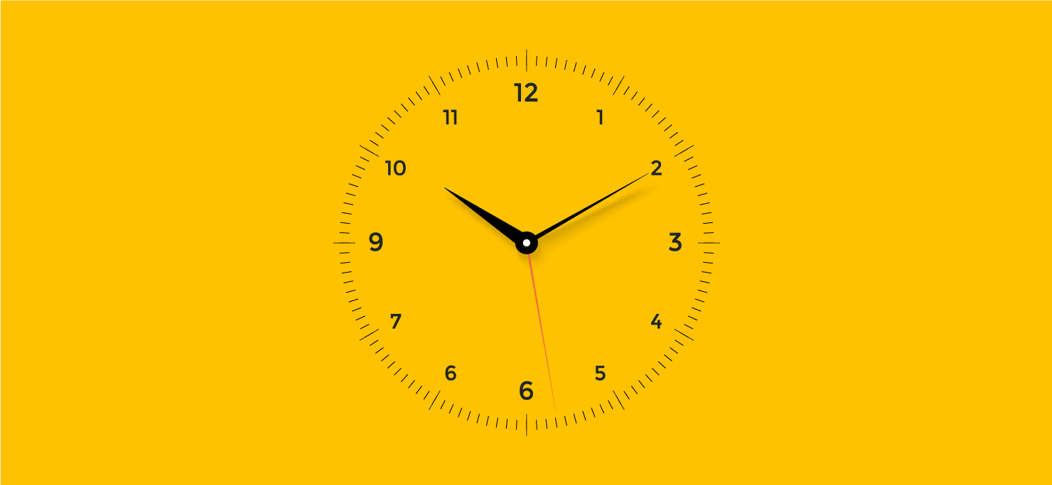 A clock on a yellow background. It is showing 10:10.