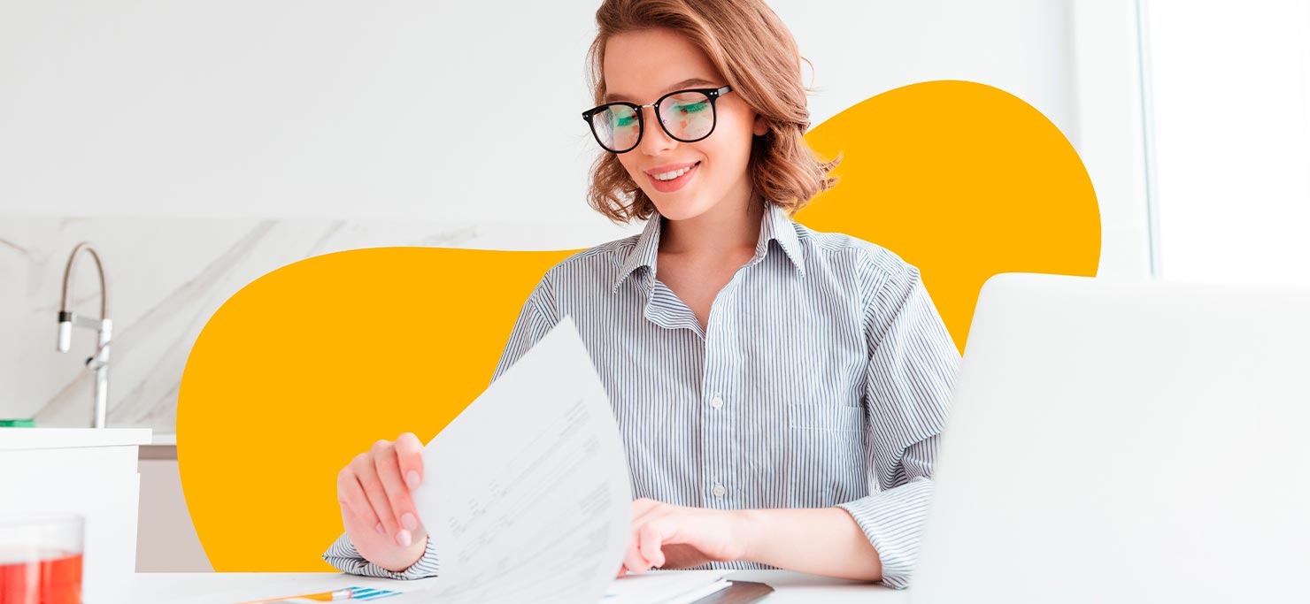 A woman going through a list, taking on what she can handle to improve her work-life balance as a freelancer.