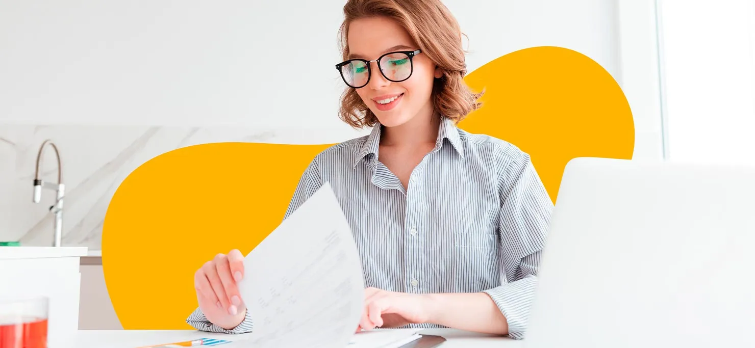 A woman going through a list, taking on what she can handle to improve her work-life balance as a freelancer.