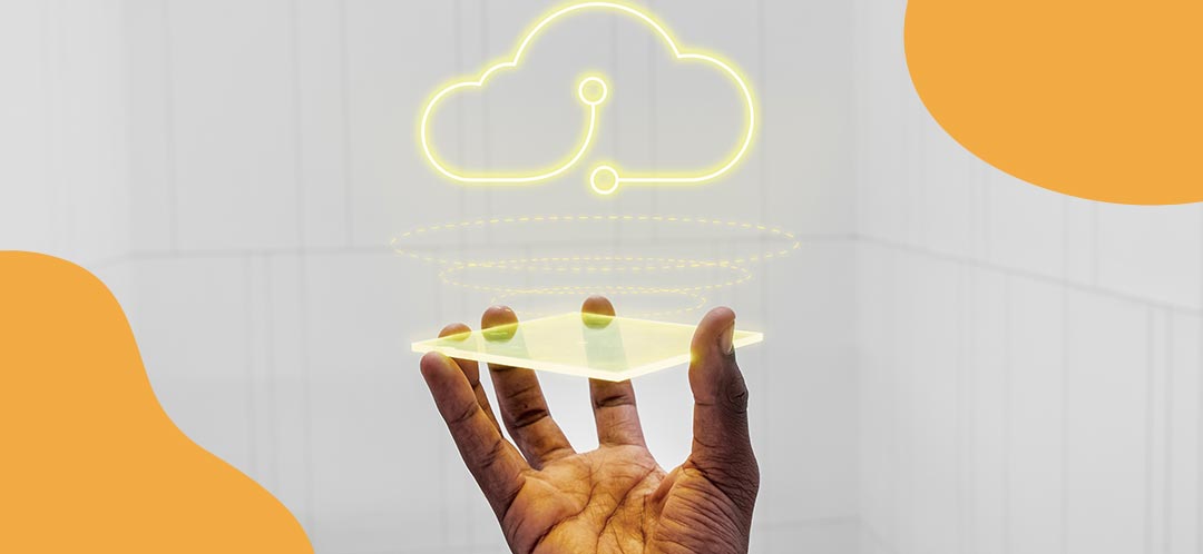 A hand holds up a translucent glass square.