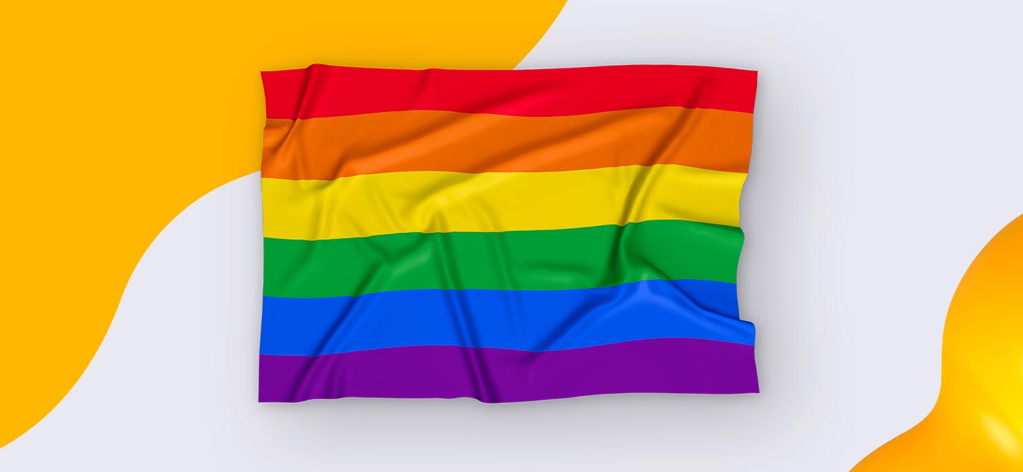 The rainbow pride flag against a yellow and white Designity background.