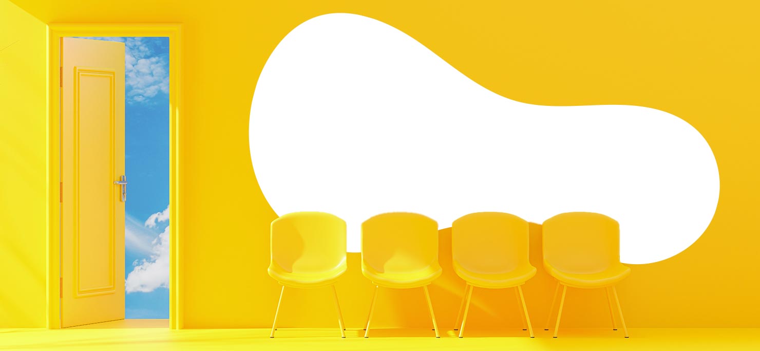 An overwhelmingly yellow room. There is an open door leading to a blue sky.