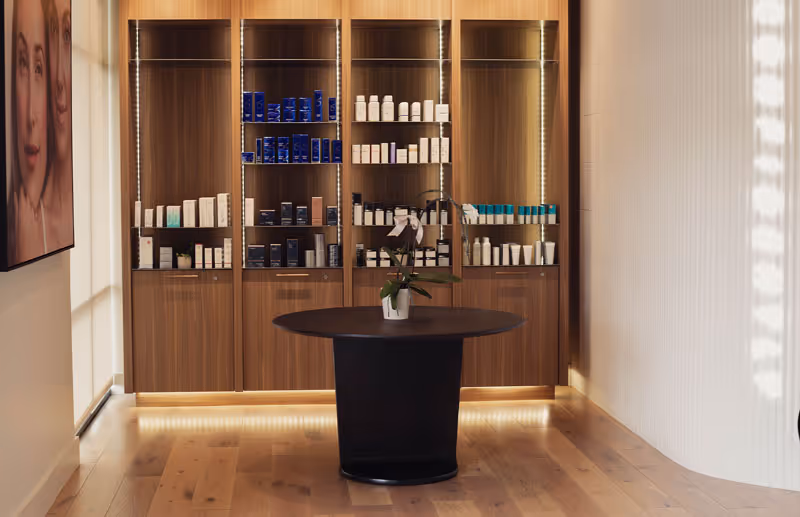 A wall of shelves containing skincare products at the Esthetics Center medical spa in Rocklin, CA