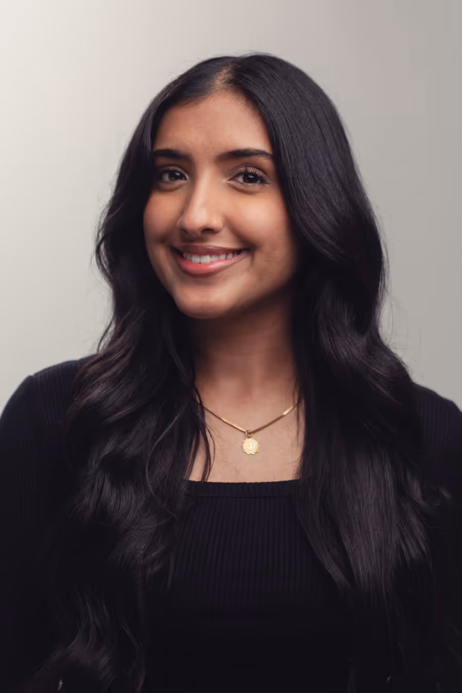 Headshot of Jasmeen Kaur, Guest Services Coordinator at Esthetics Center med spa