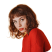 Young woman with short curly brown hair wearing a red top looking to the side.