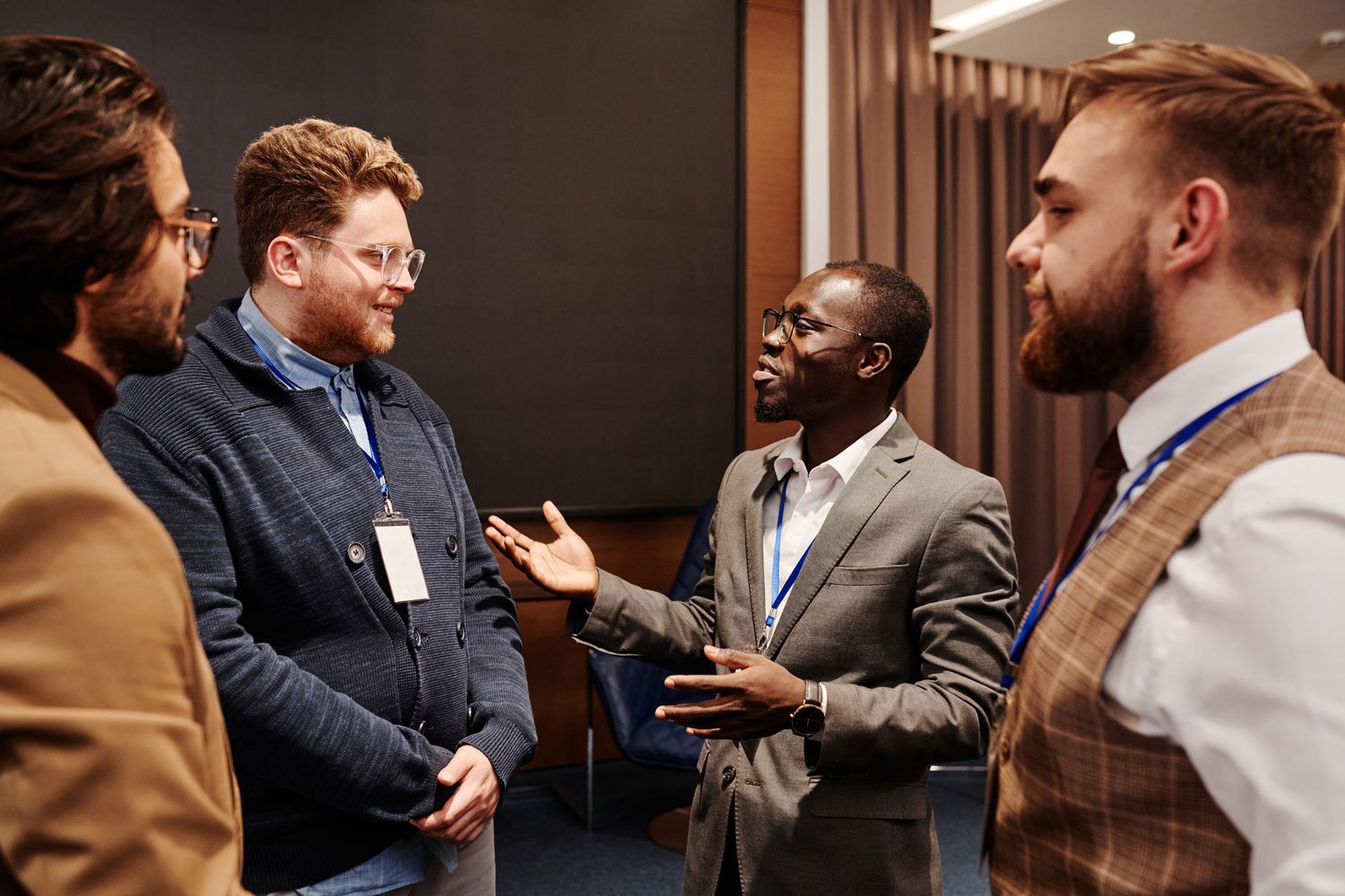 Attendees networking in a busy event hall