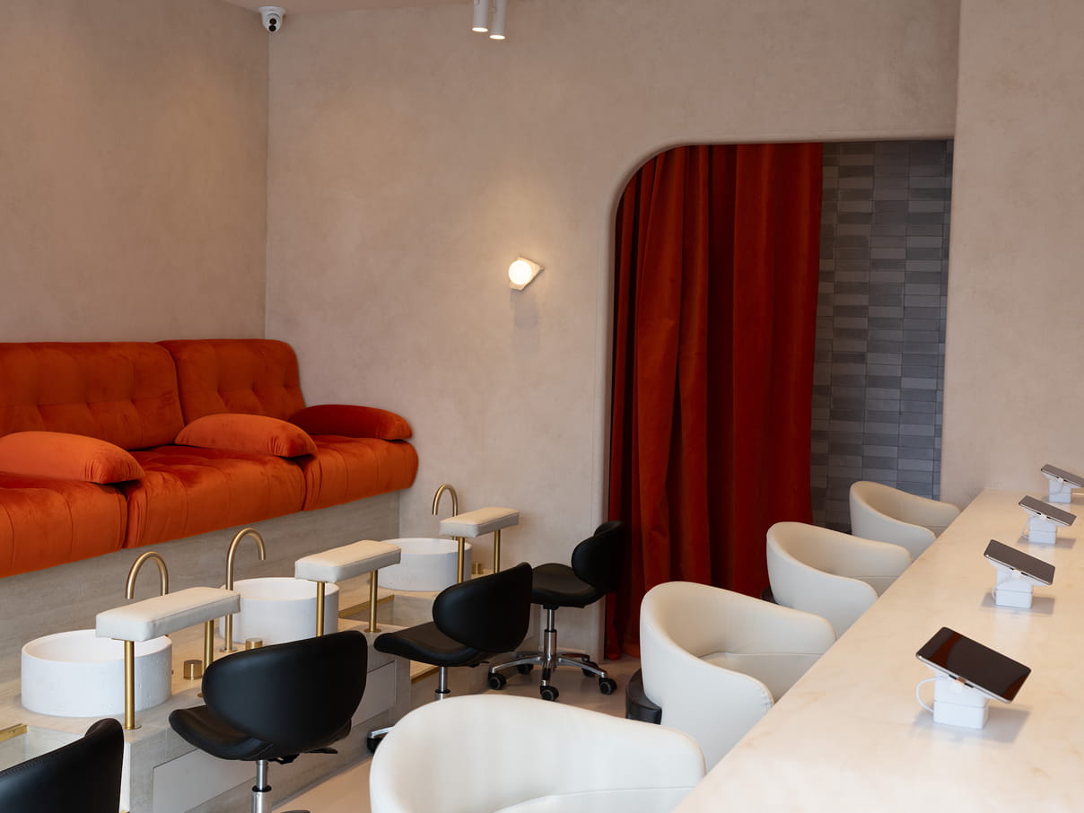 Nail artists working with clients at the Manchester Street salon