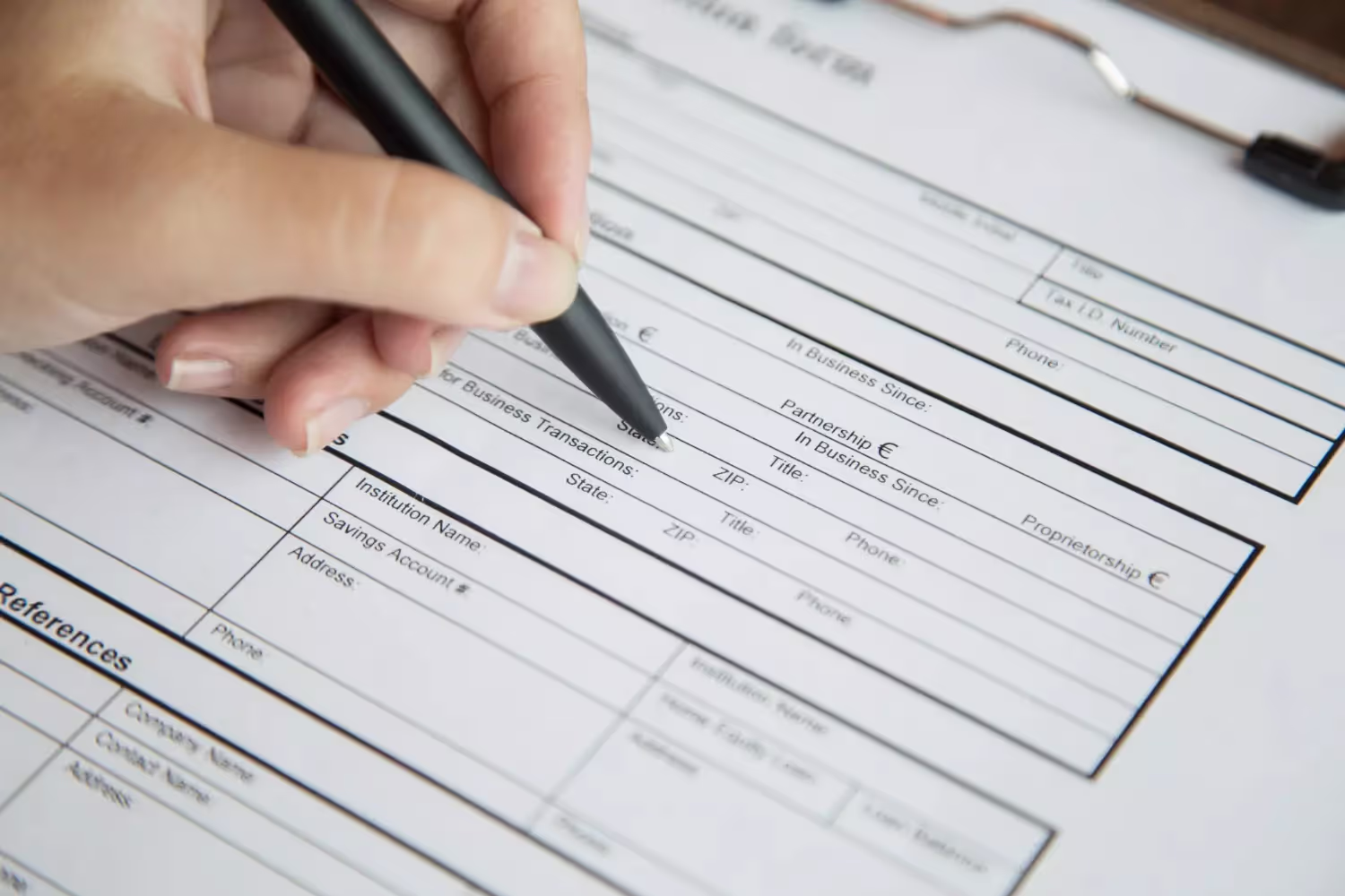 A visual representation of someone filling the Form 1096 document with sections, symbolizing the importance of IRS reporting and tax compliance