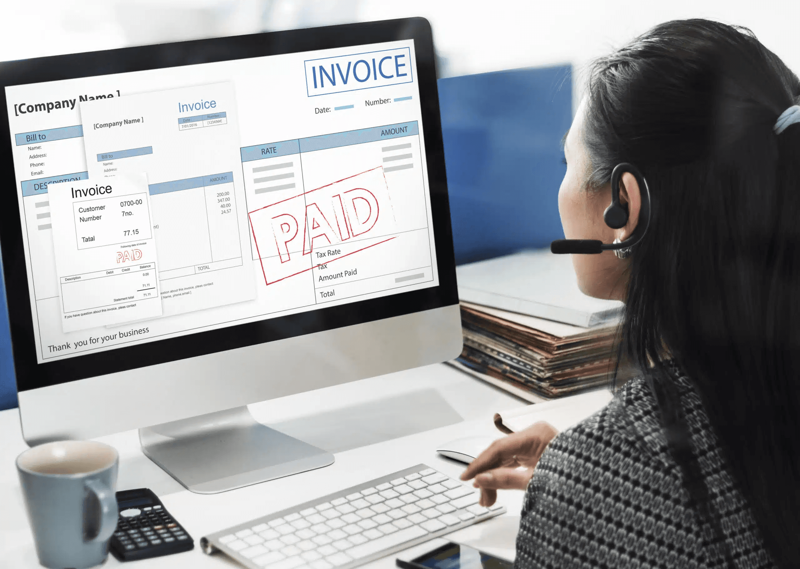 Woman processing digital invoices and payments - How to Pay Overseas Employees