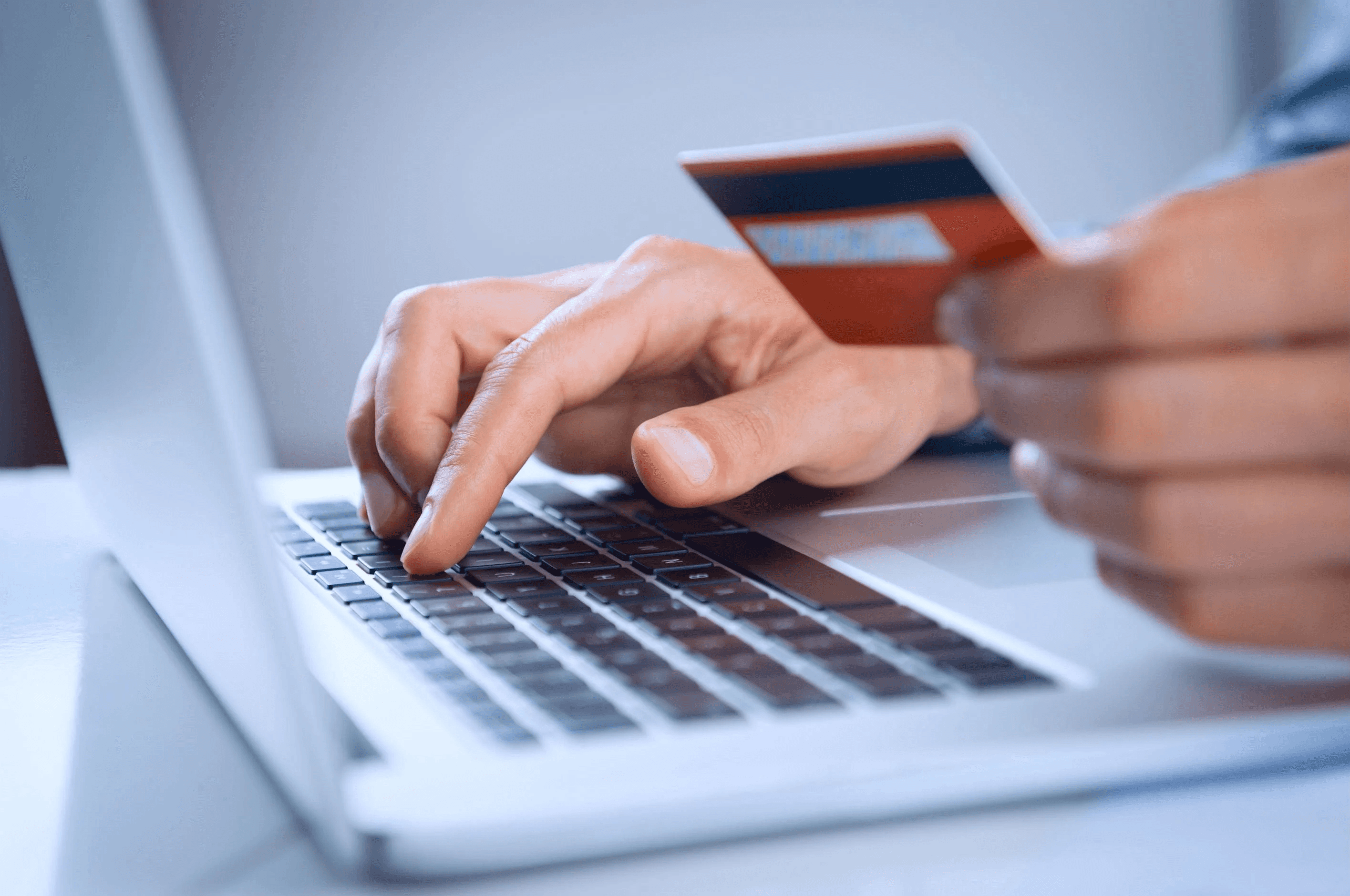 Online credit card payment on laptop - How to Pay Overseas Employees