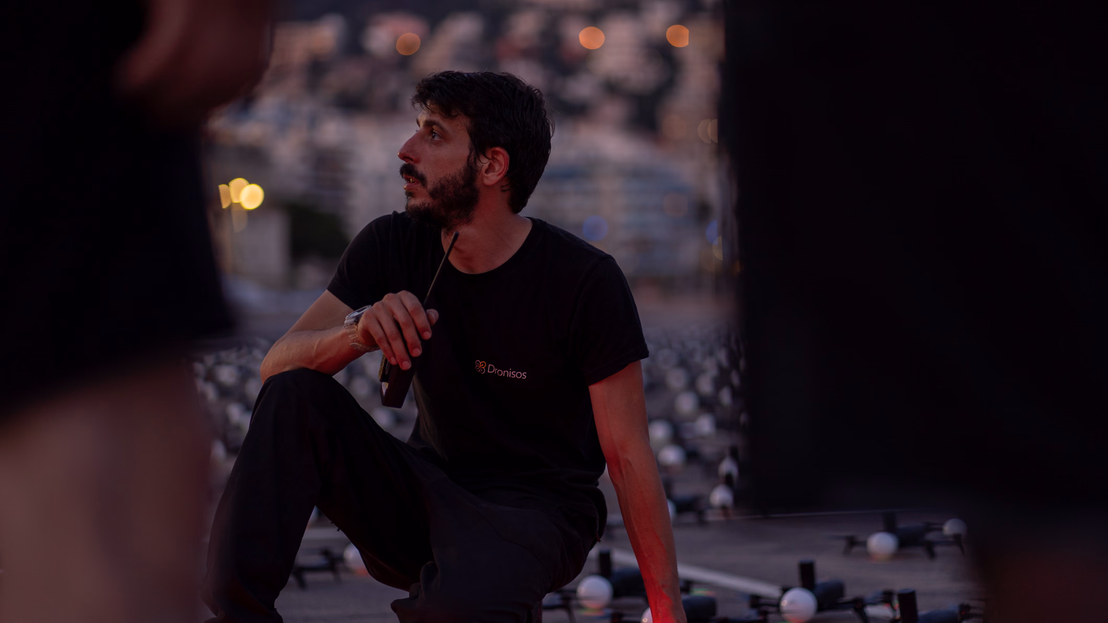 Dronisos team member supervising the drone fleet on the ground prior to takeoff.