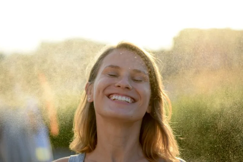 Woman experiencing different symptoms related to hormone balance in an estradiol vs estrogen comparison