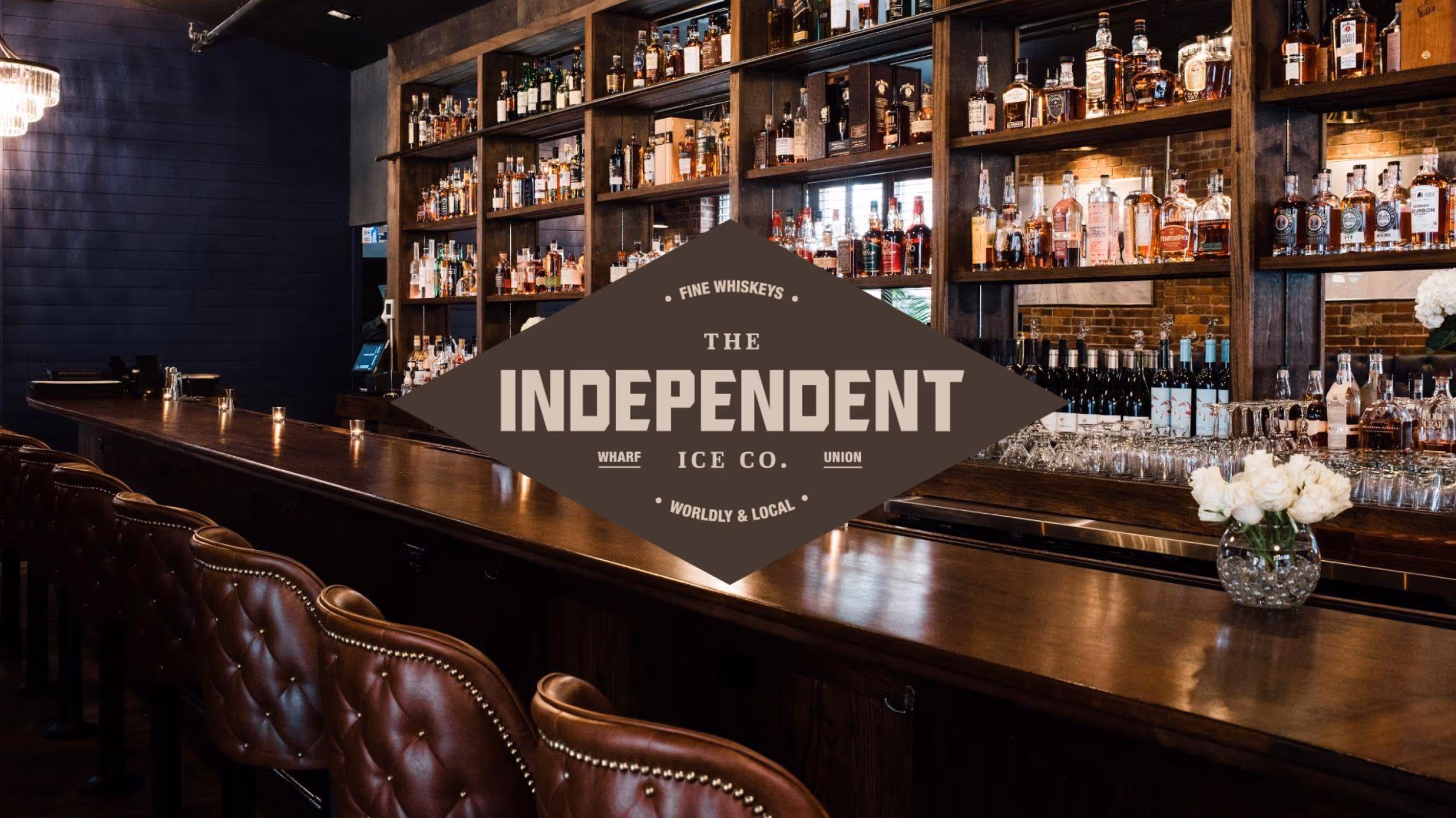 The Independent whiskey bar with leather chairs and extensive liquor collection