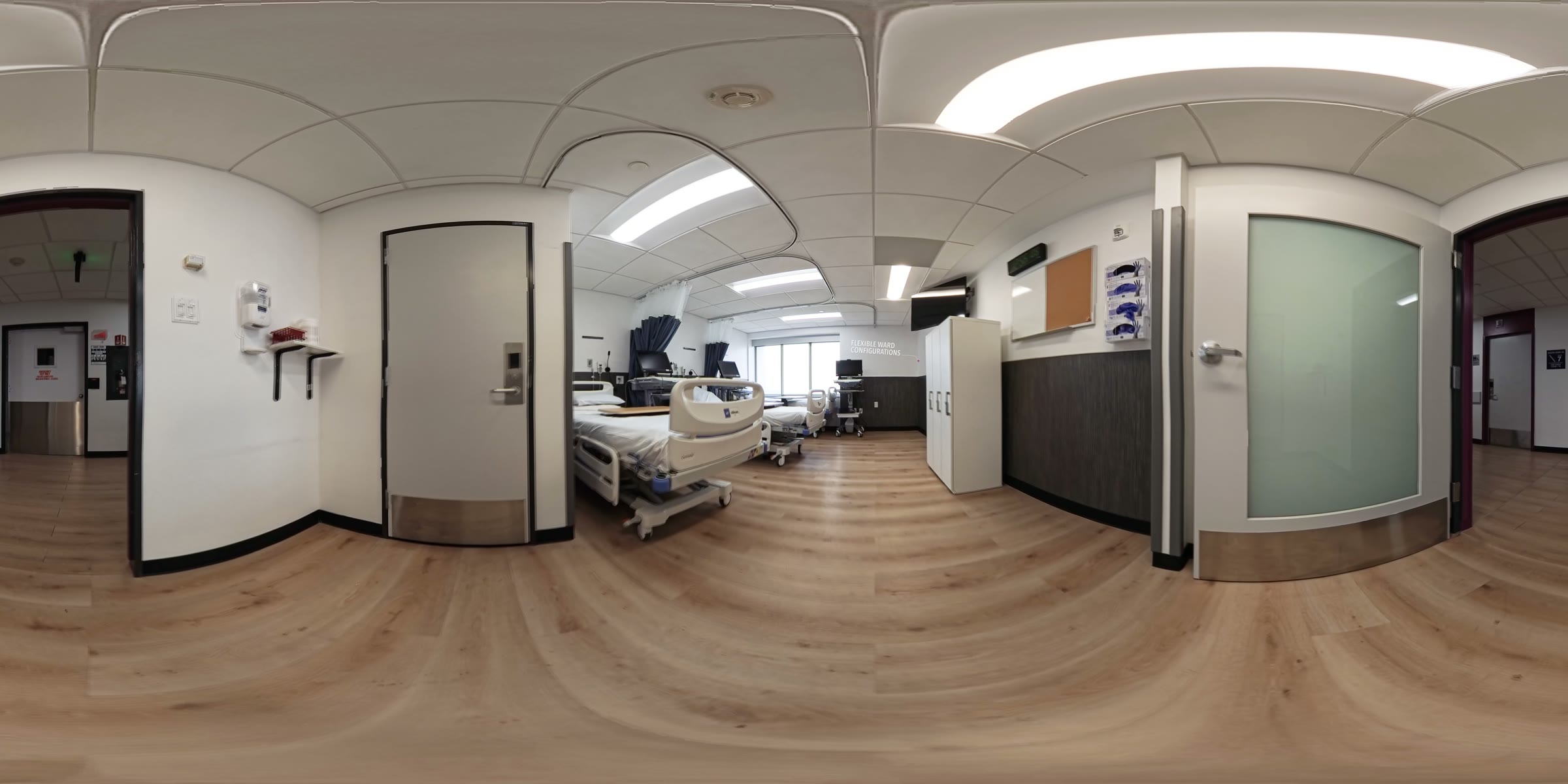 360-degree view of a flexible patient ward, with a hospital-style bed and wall signage reading Flexible Ward Configurations.