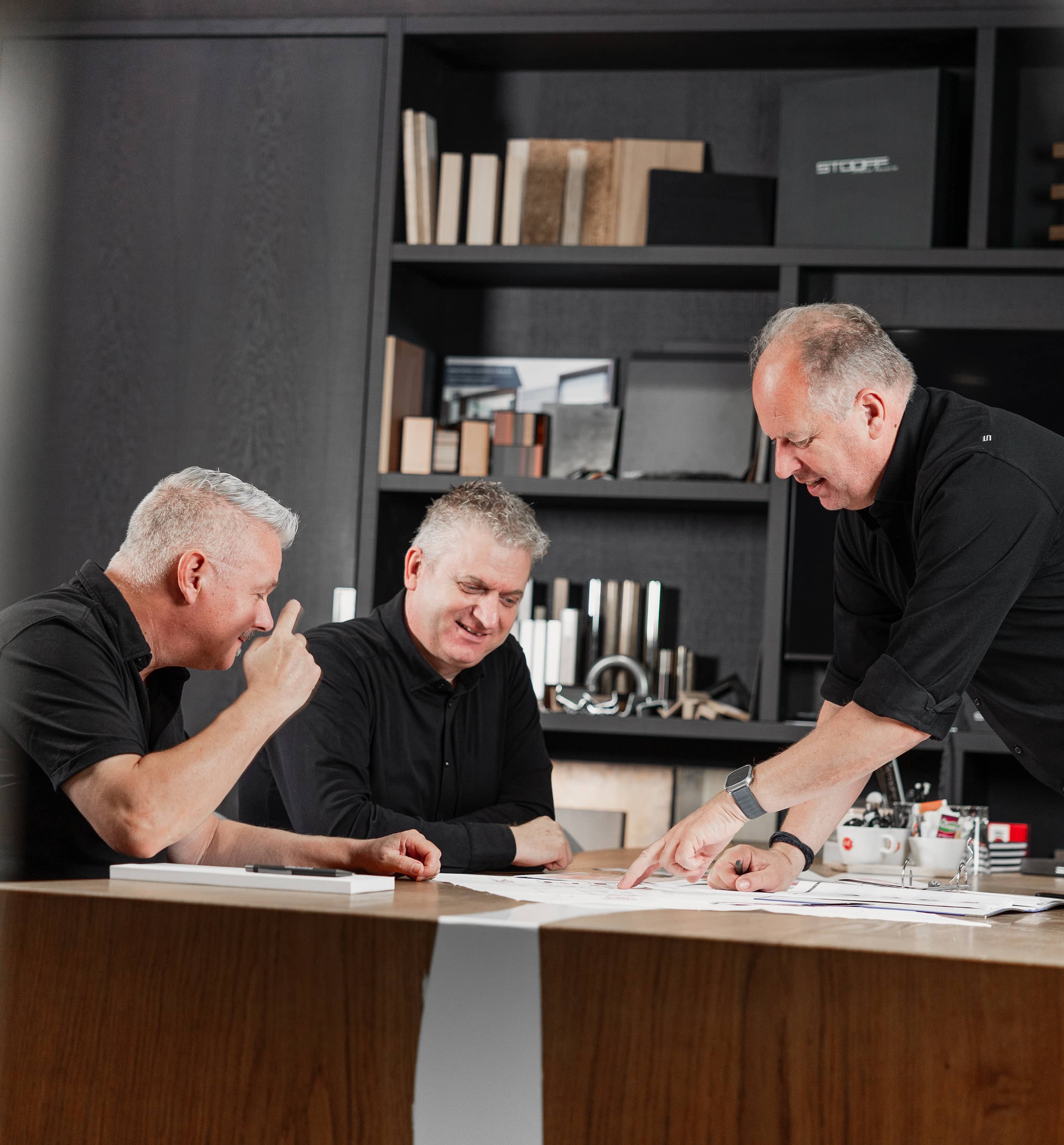 STOOFF's work planners are meeting at a desk