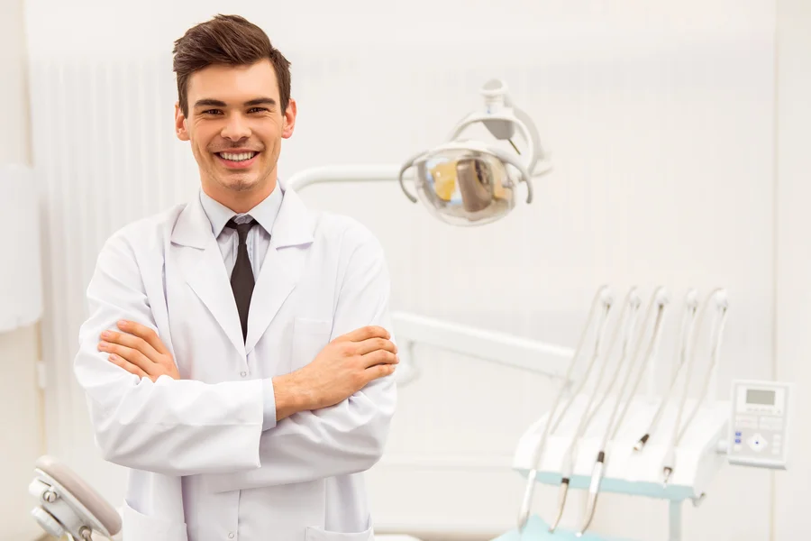 smiling-male-dentist-in-office-dental-office-glen-il