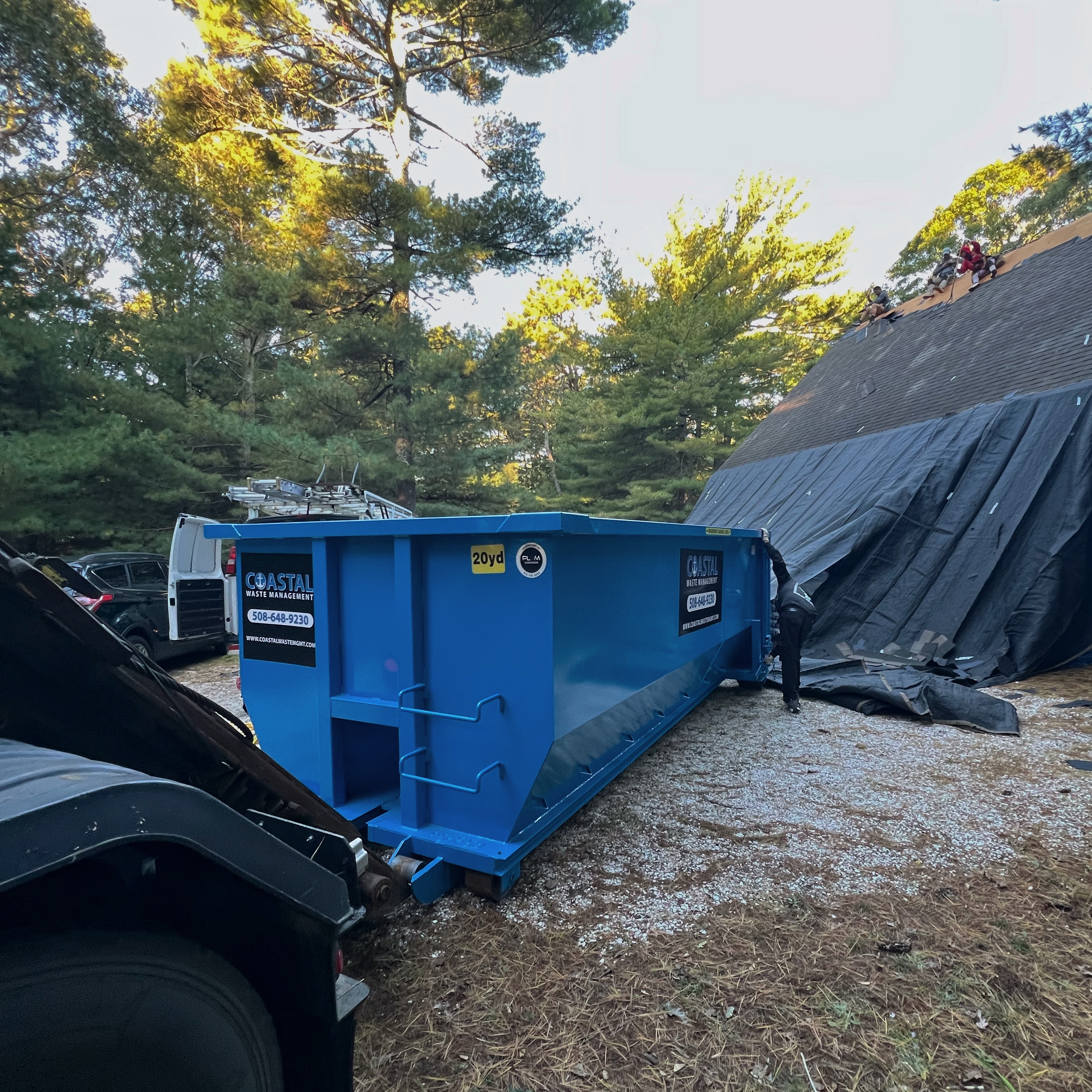 20 yard dumpster for a roofing job on Cape Cod