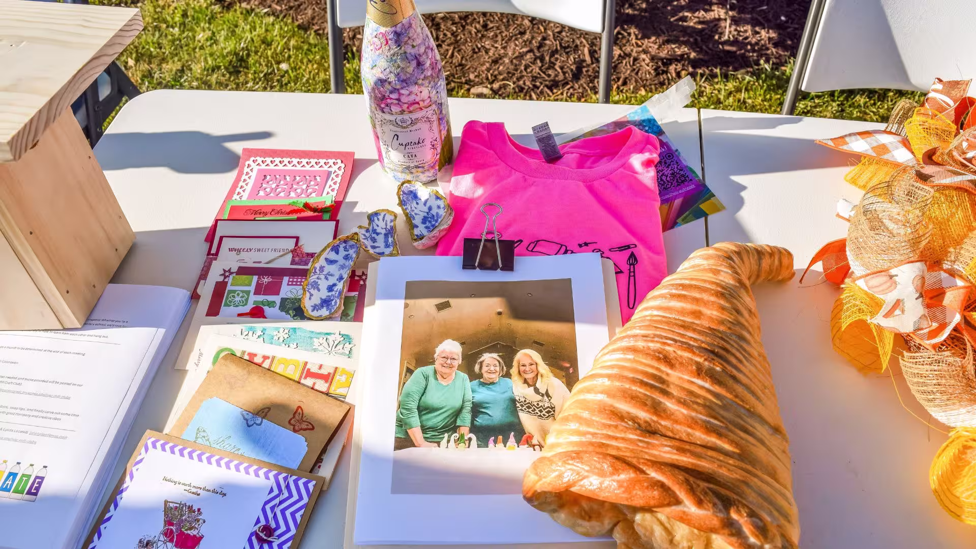 A table with food, cards and wine 