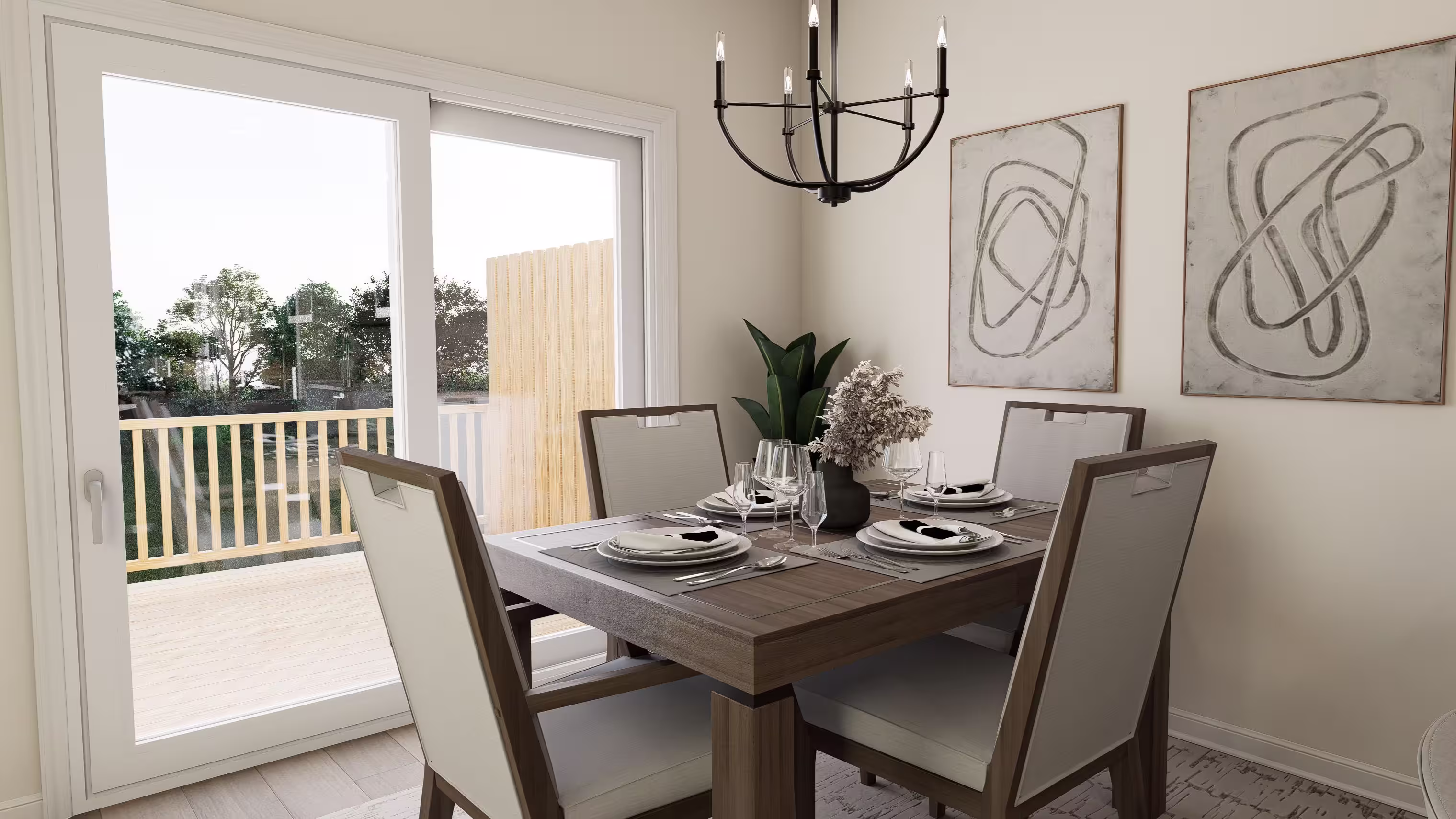 Modern, sleek kitchen table with four setups in front of a large walk-out porch.