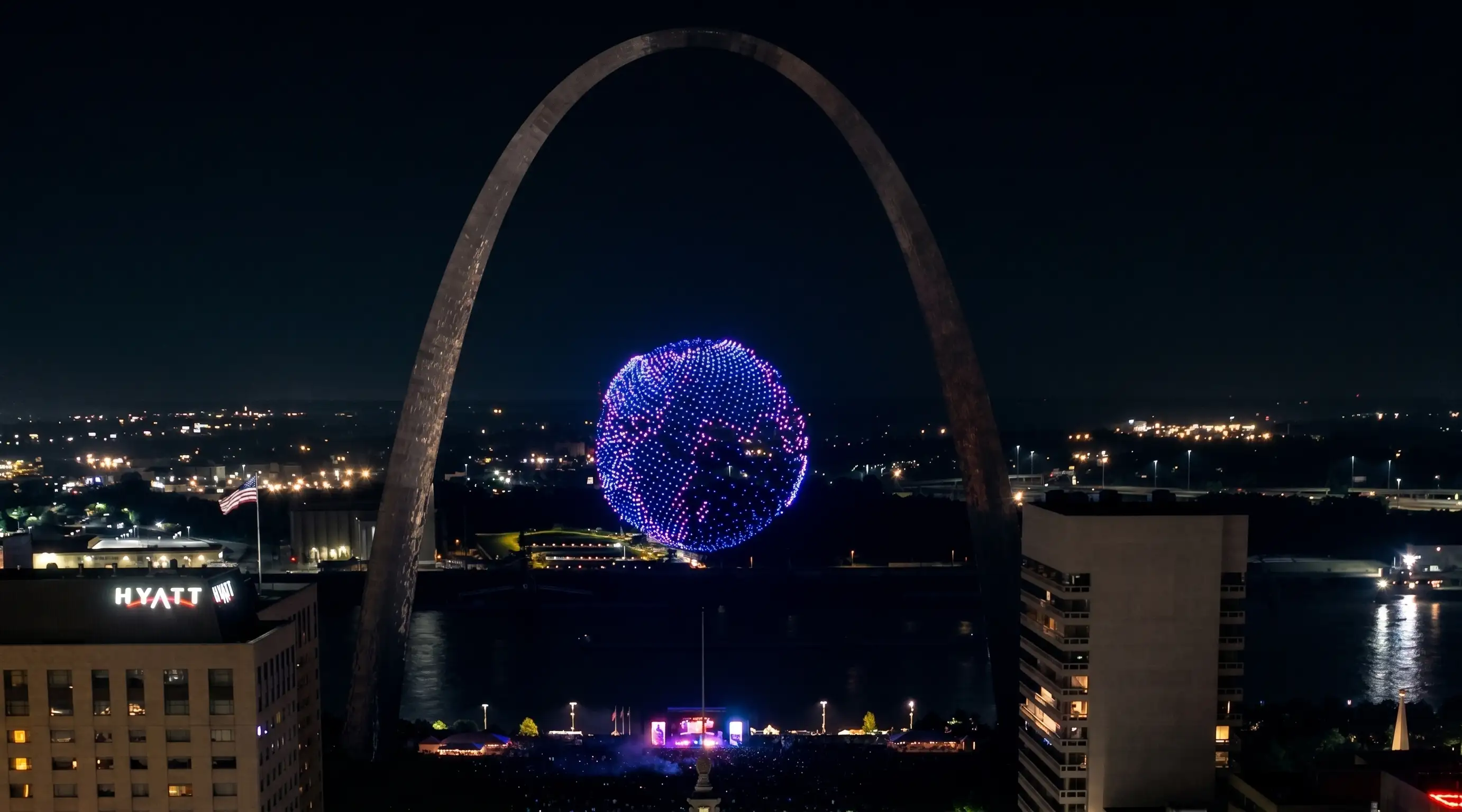 Dronisos drone light show through the Gateway Arch in St. Louis