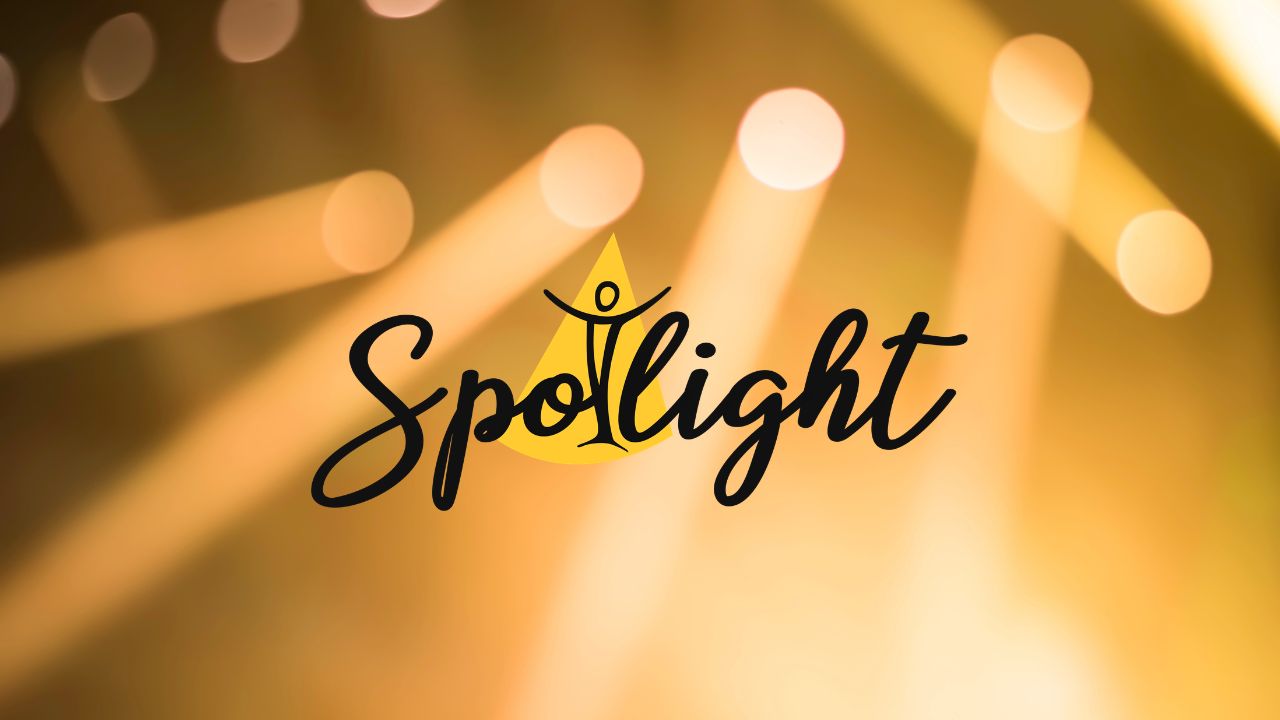 Spotlit background with Spotlight Theatre Orangeville Logo
