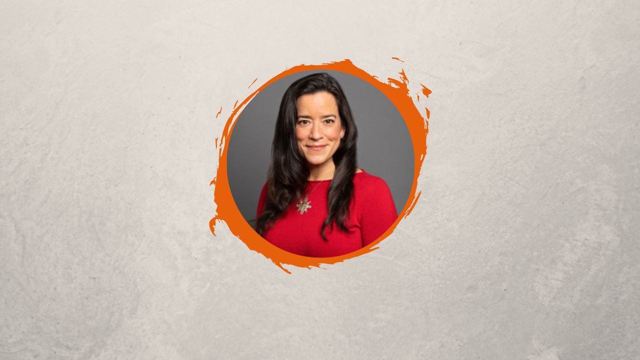 Headshot of author Jody Wilson-Raybould on an orange circular background