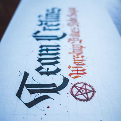 6x12" custom nameplates written in varied heights of modern Fraktur calligraphy. Names of specific professional cyclists as well as an amateur cycling club.