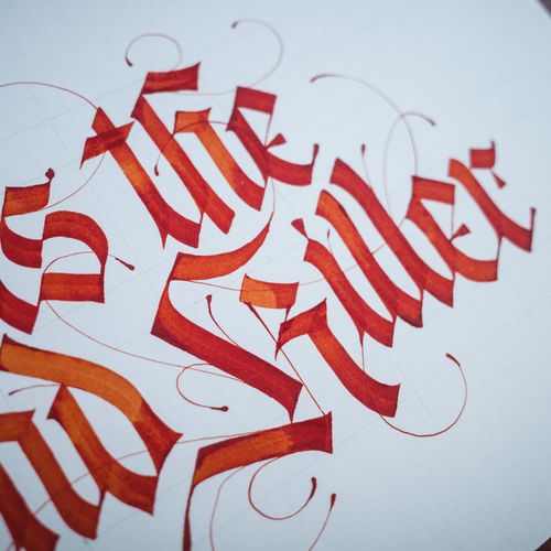 "Fear is the Mind-Killer," quoted from Frank Herbert's 'Dune', written in modern Fraktur calligraphy.