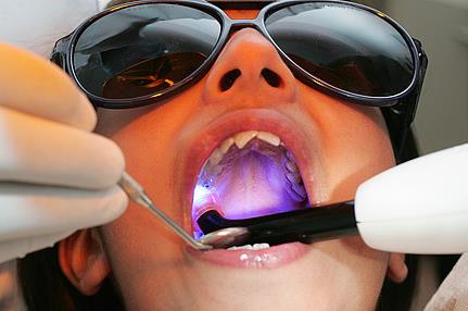 Child receiving dental treatment