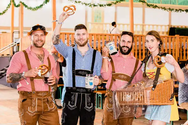 Photo from Oktoberfest of people dressed in German costumes