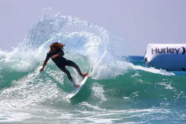 Image of a Surfer with Hurley branding in the background