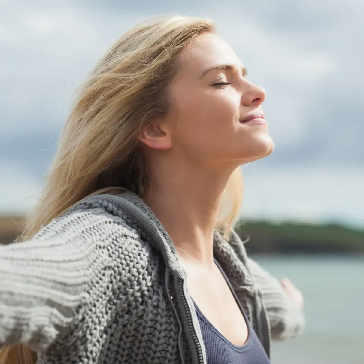 Woman dancing in the sunlight