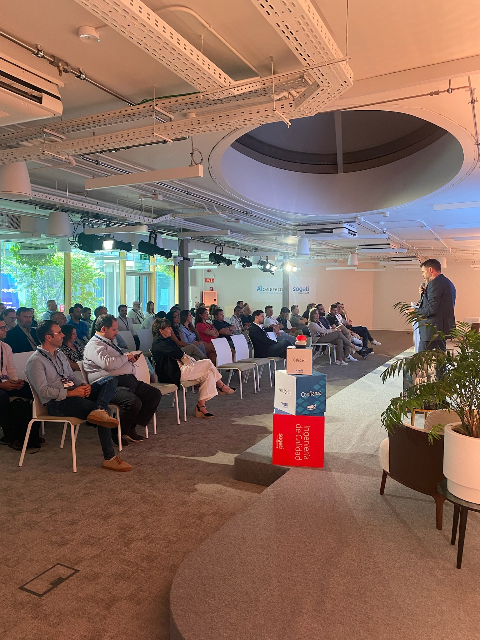 A group of people sitting in an auditorium during a training session