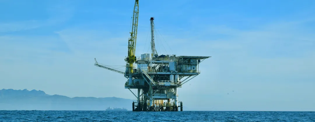 Photo of an oil rig at sea
