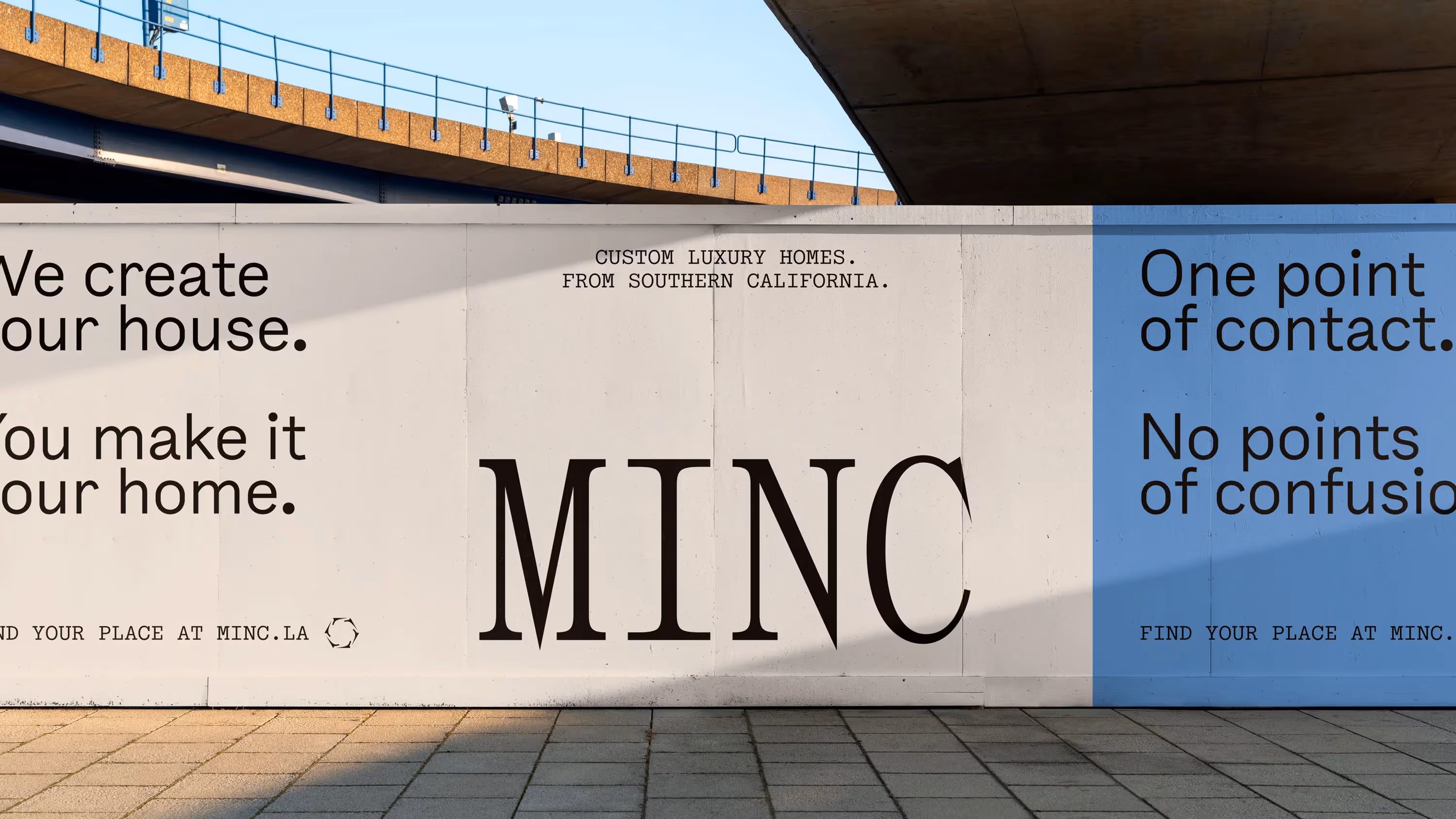 A billboard outside displays Minc branding. Logo, typography, and colors are highlighted.