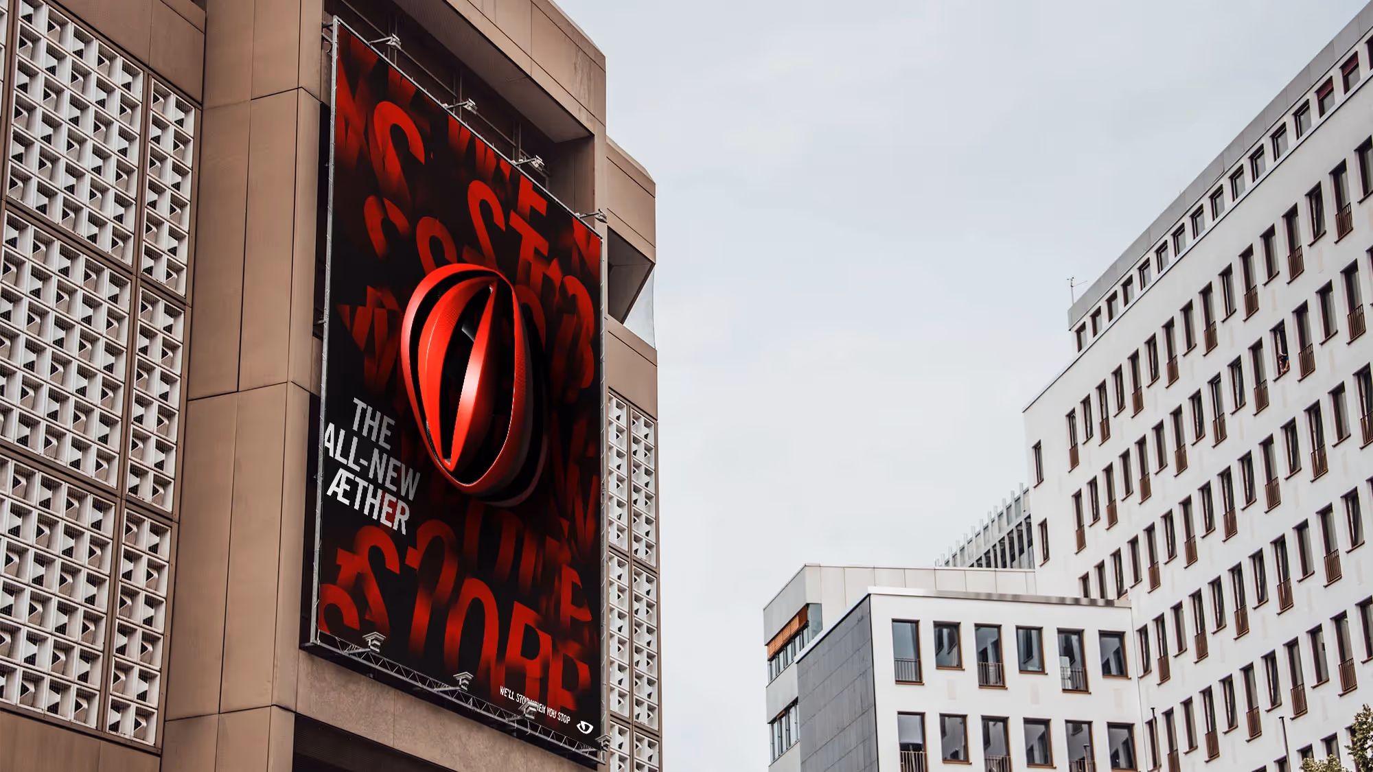 A large Giro advertisement on the side of a mid-rise building.