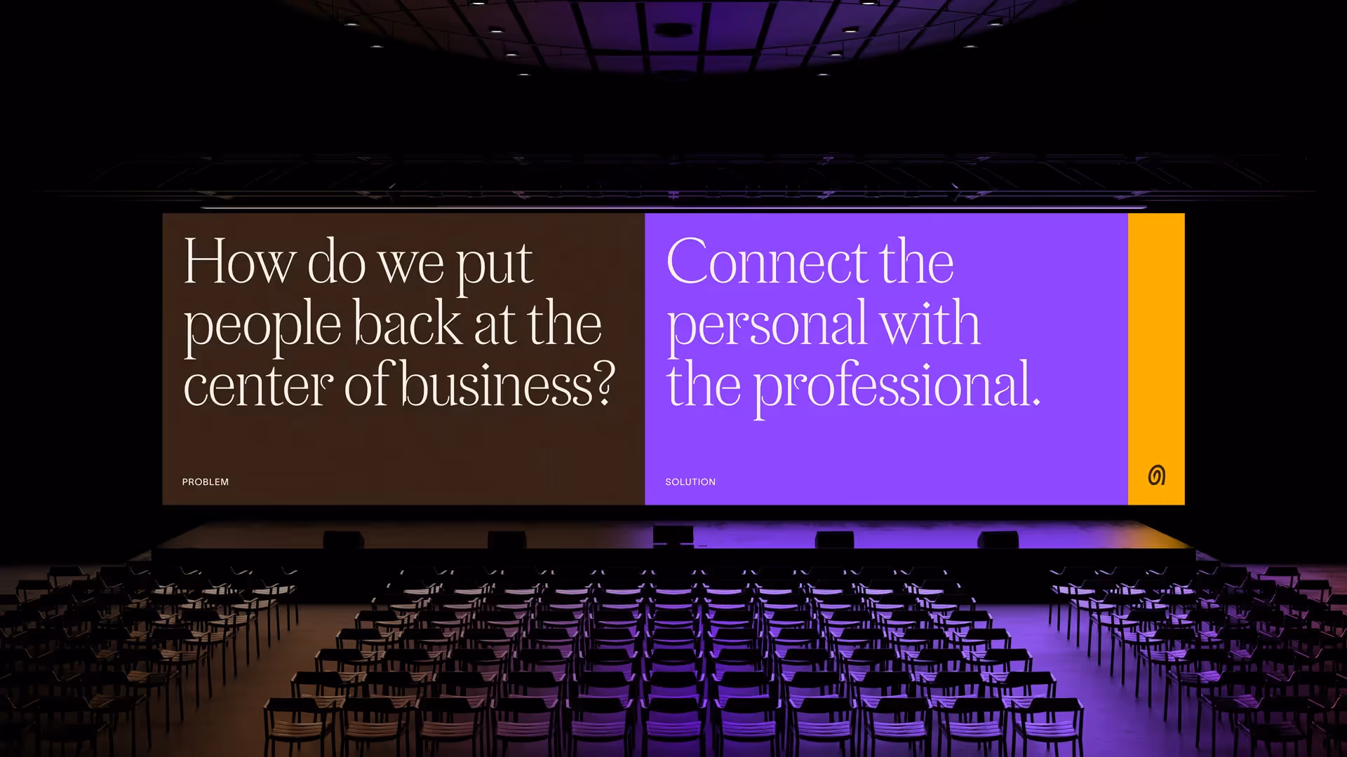 An empty conference hall with an Augur-branded presentation displayed