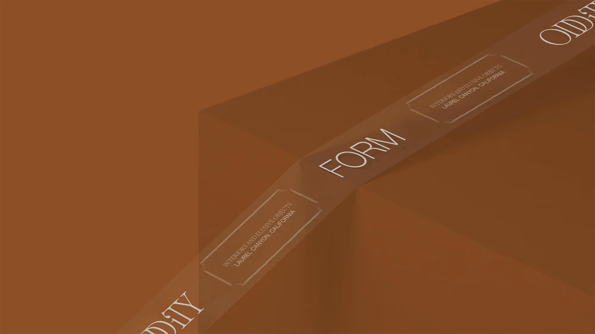Branded tape positioned along the edge of a box.