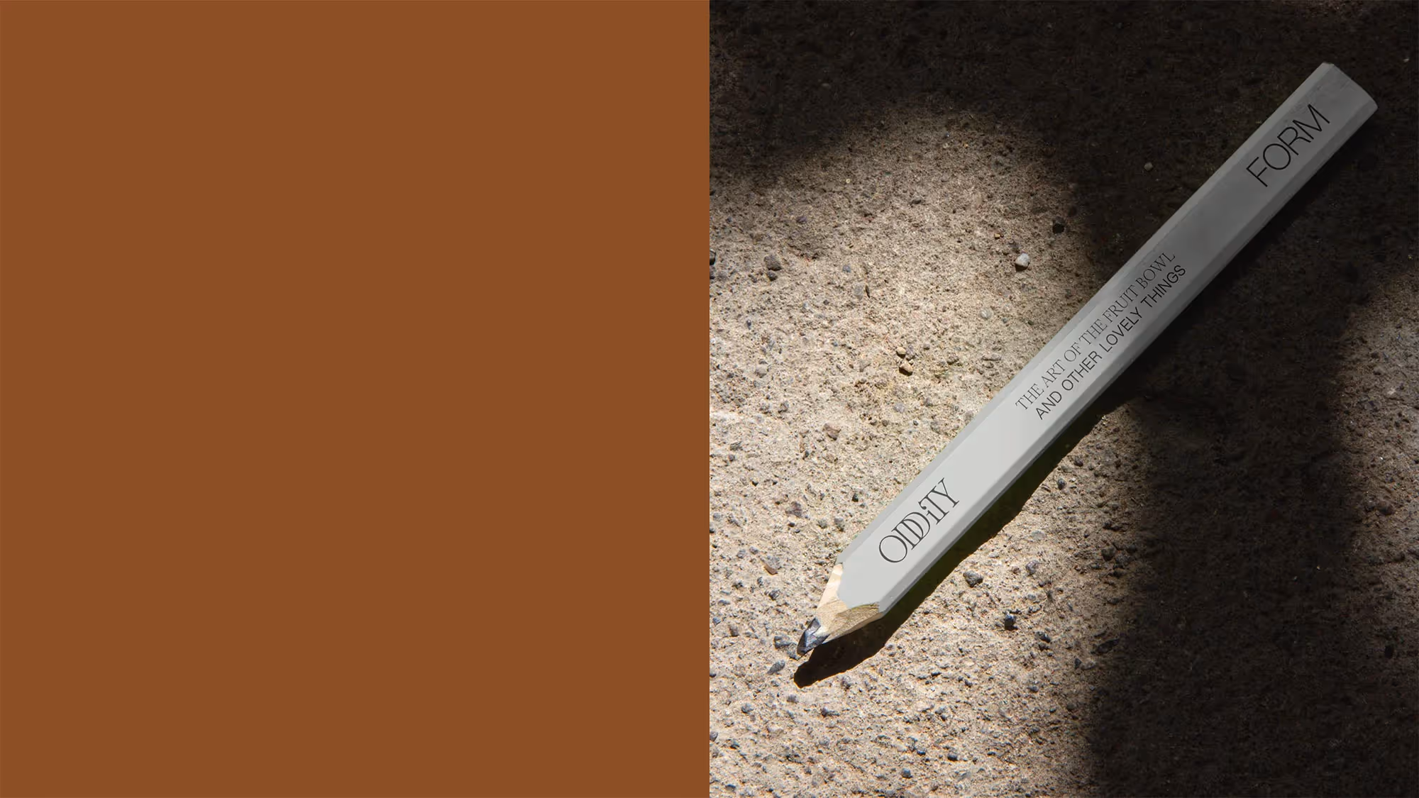 A branded pencil featuring the Oddity Form logo and tagline.