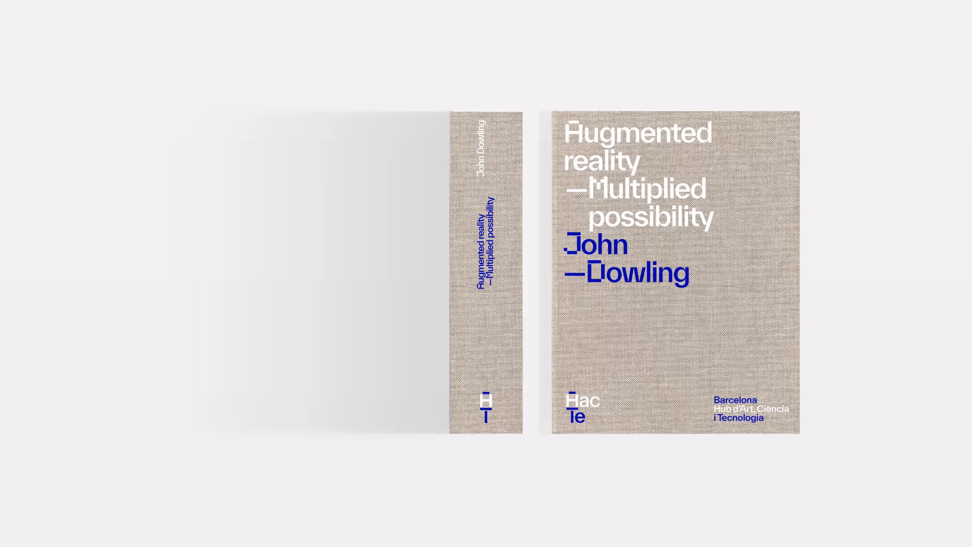 An overhead view of a HacTe-published book, set on a light grey background.