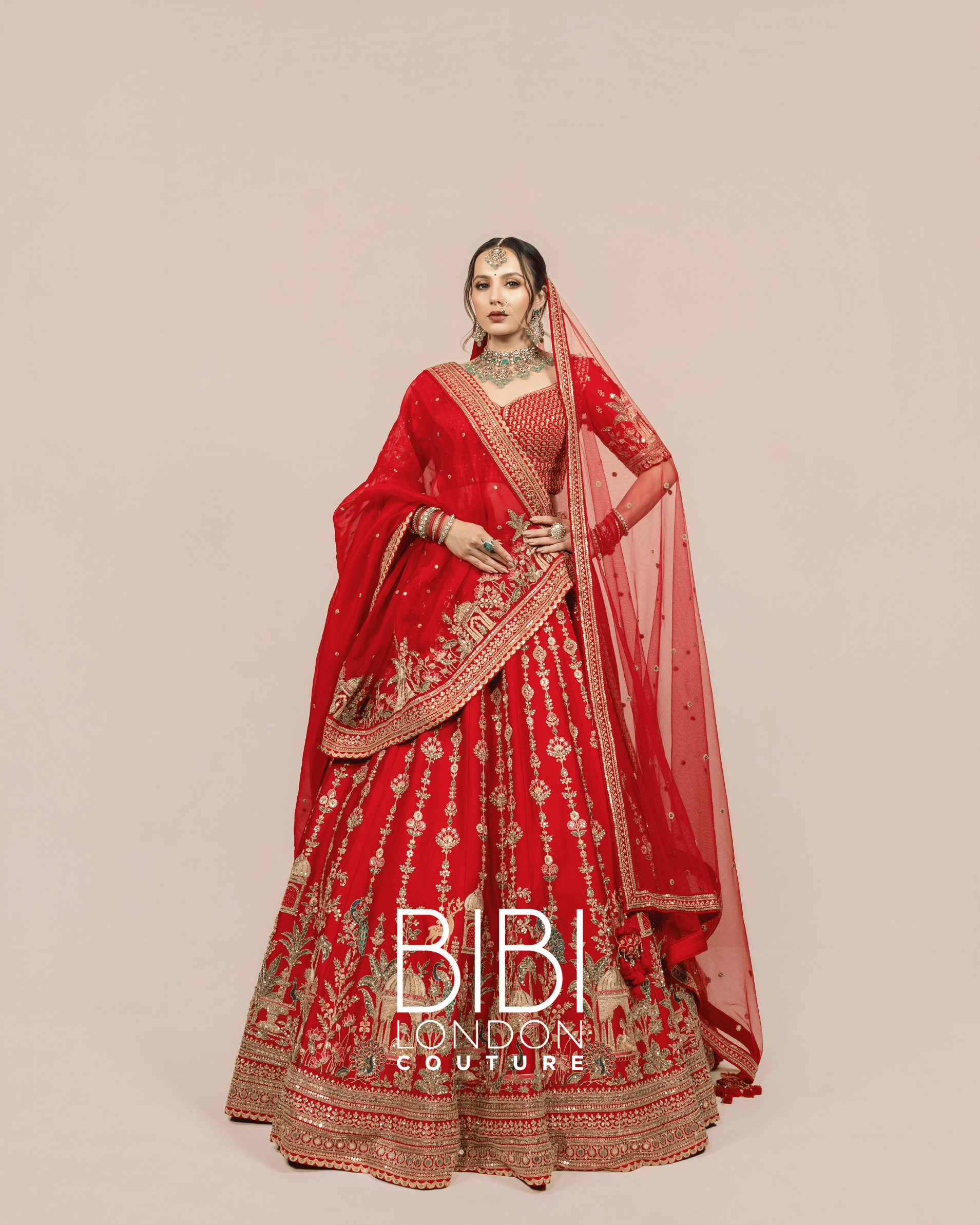 Red Lehenga with Palace Motifs and Animal Detailing 