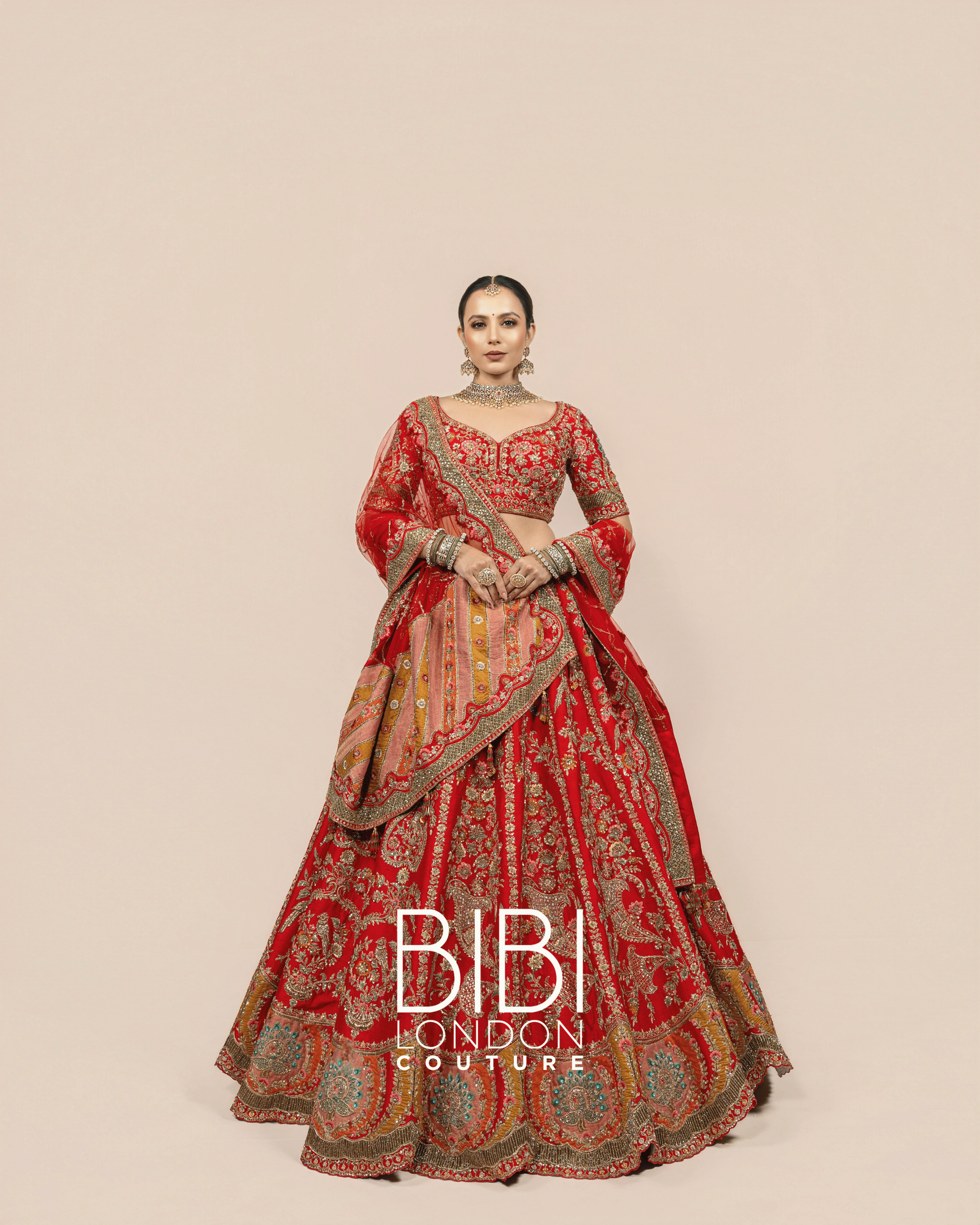 Vermilion Lehenga with Multicolour Panel Embroidery
