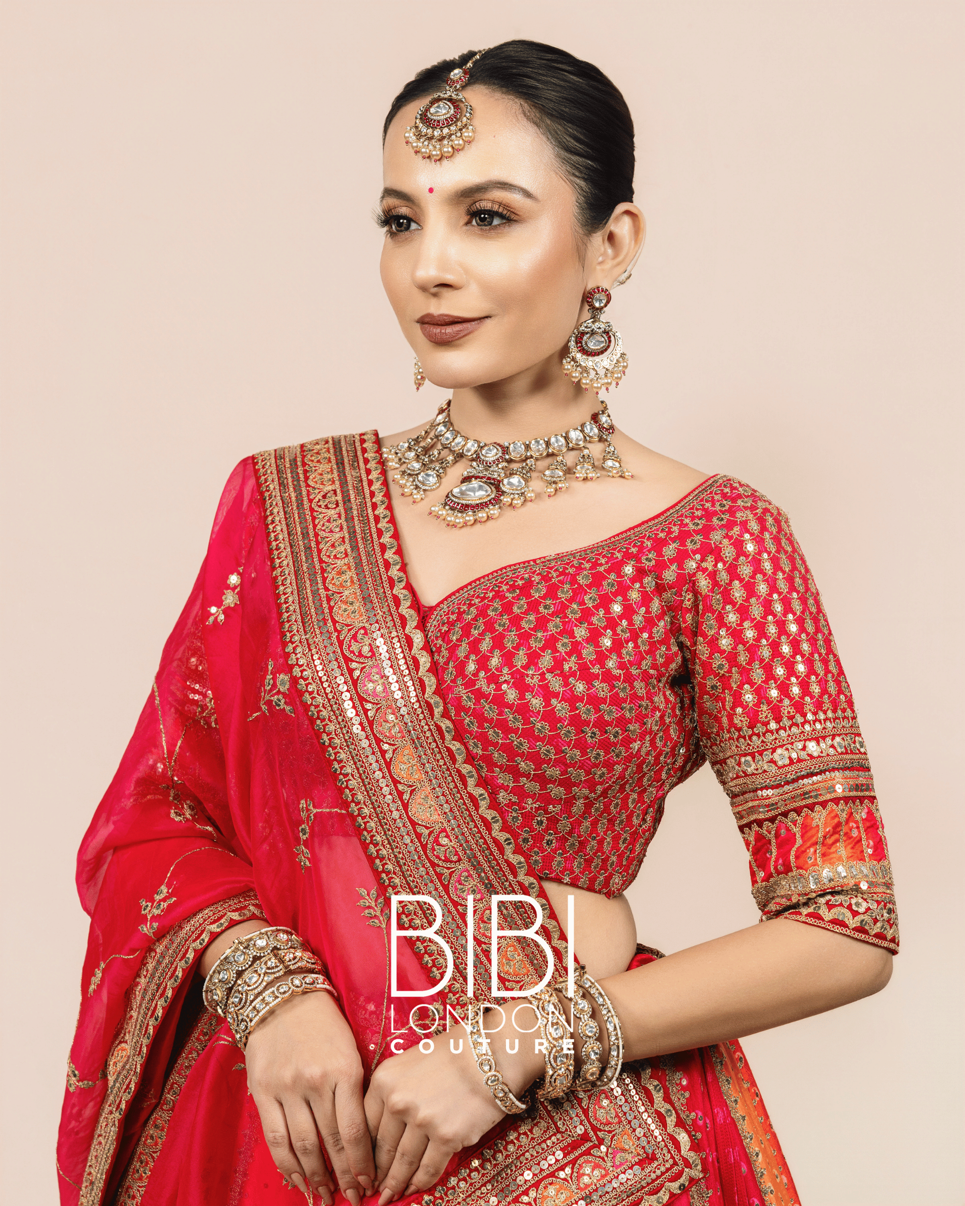 Multicolour Paneled Lehenga with Fuchsia Embroidered Blouse